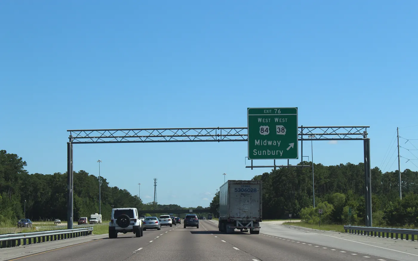 Overhead sign on northbound I-95 at Exit 76 for US-84 and GA-38, Midway and Sunbury