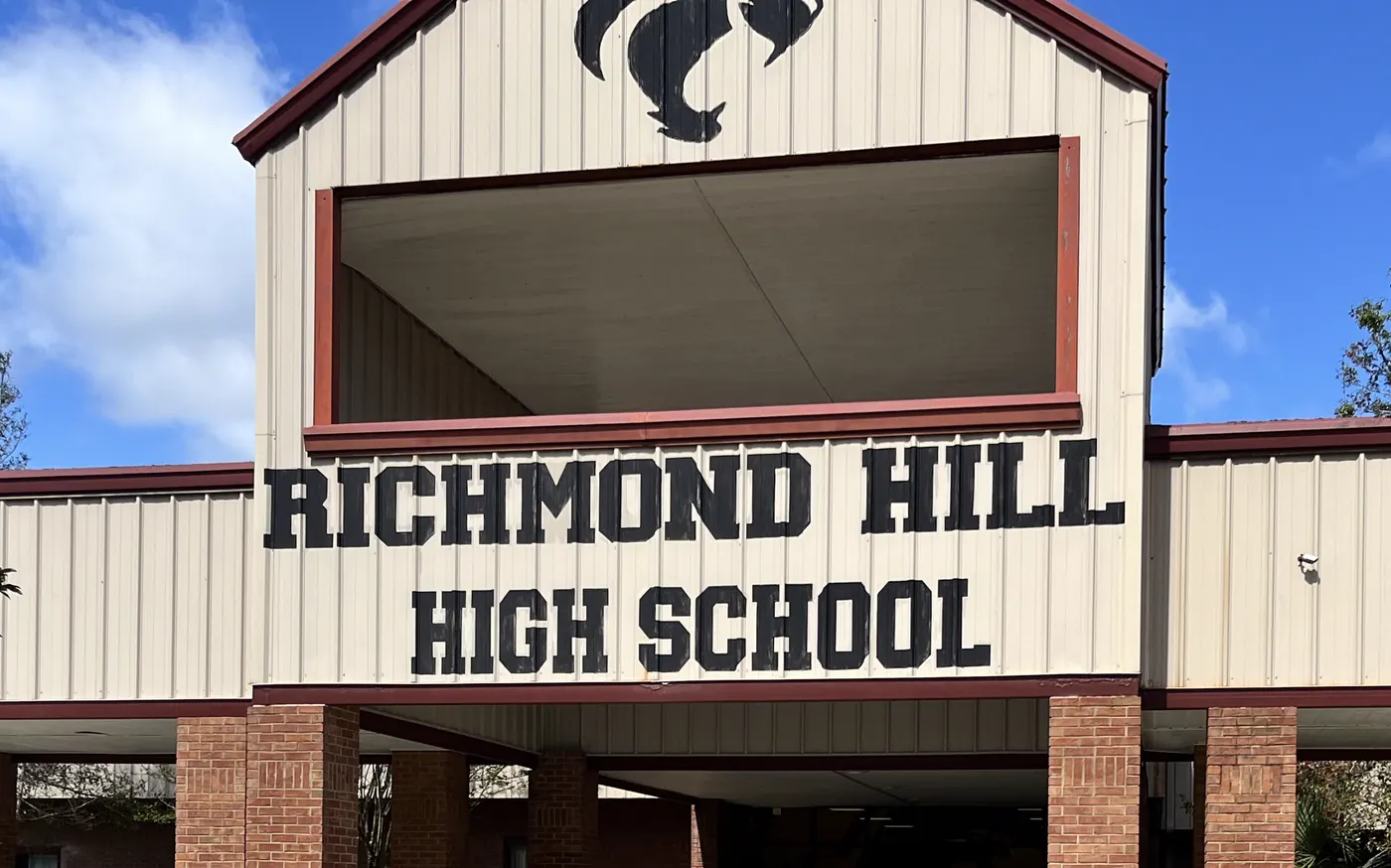 The front entrance canopy of Richmond Hill High School in Richmond Hill, Georgia, with the school's name across the top